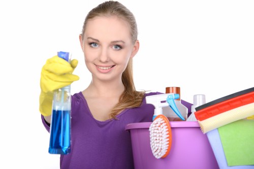 Cleaning specialist treating a carpet stain with suitable equipment